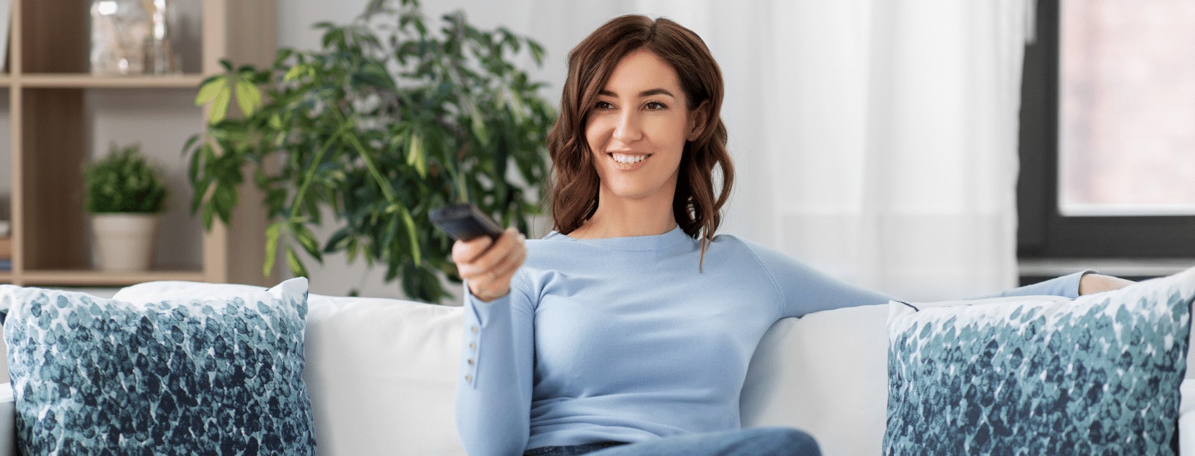 Woman Remote Watching TV